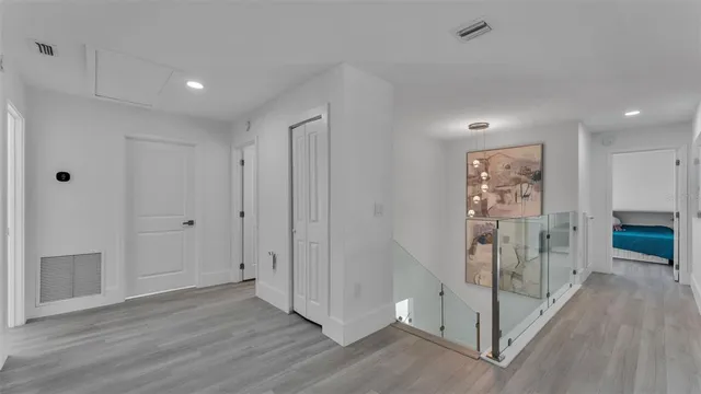 a view of entryway with wooden floor