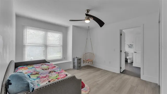 a view of yard with swimming pool and sitting area