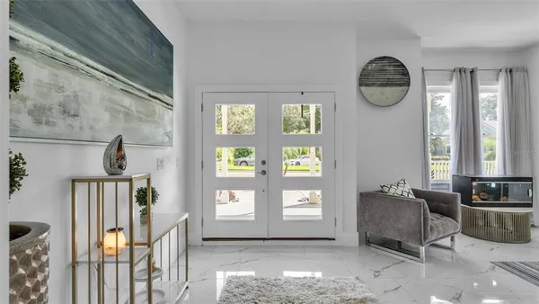 a kitchen with cabinets and stainless steel appliances