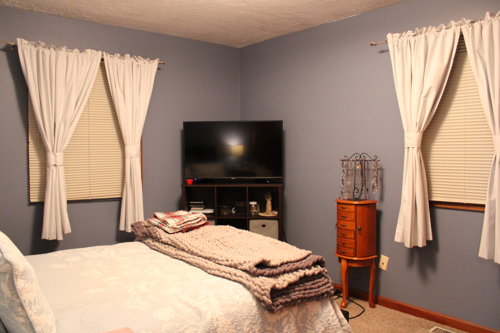 902 Charlotte Drive Normal, IL 61761 - Photo 11 of 35 a bedroom with a bed and a flat screen tv