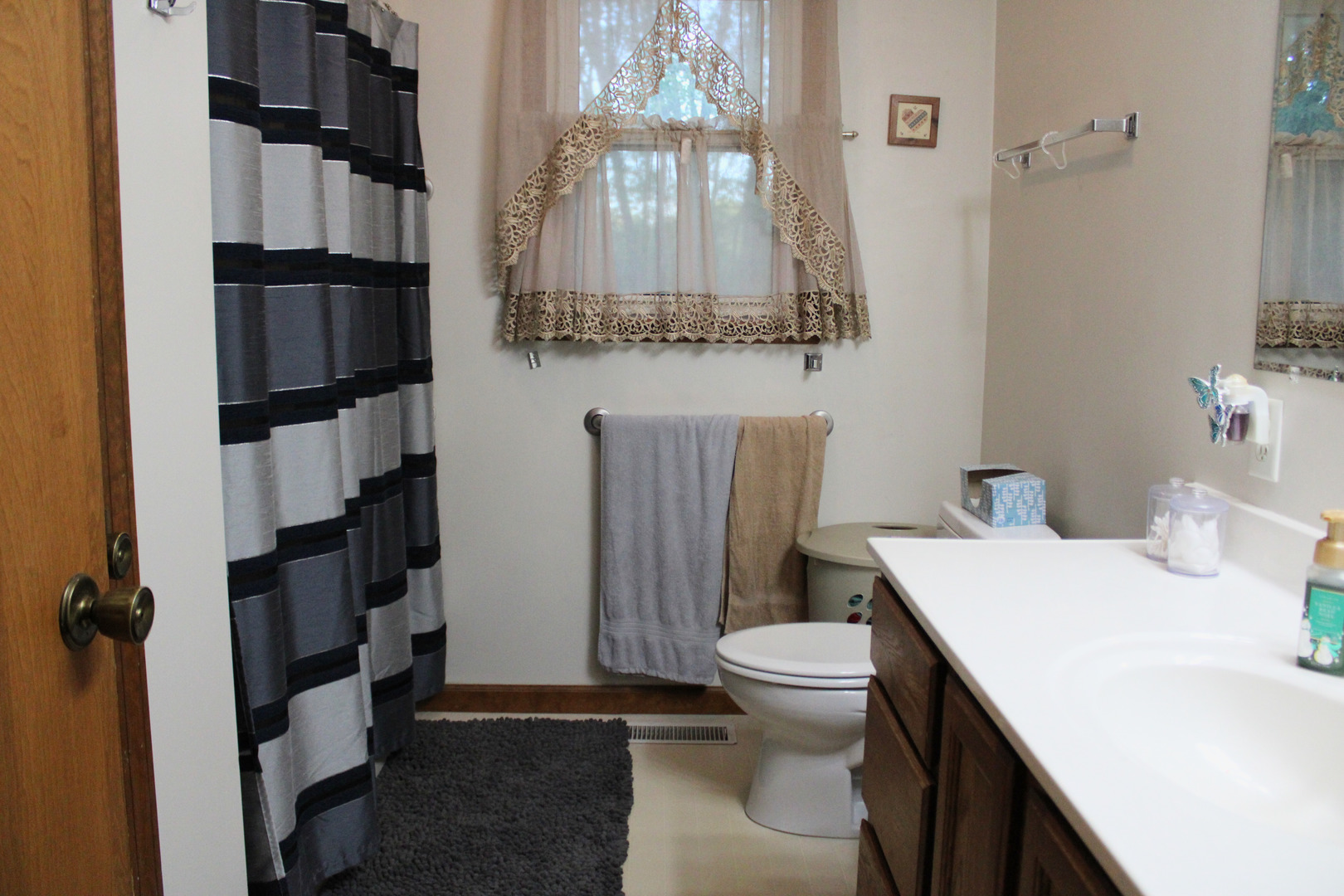 902 Charlotte Drive Normal, IL 61761 - Photo 17 of 35 a bathroom with a sink and toilet