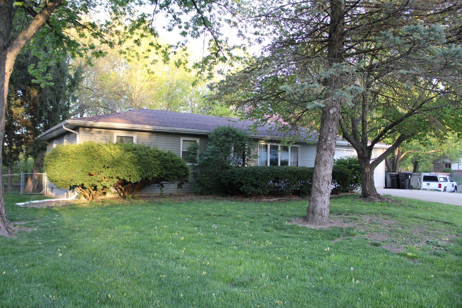 902 Charlotte Drive Normal, IL 61761 - Photo 2 of 35 a front view of a house with garden
