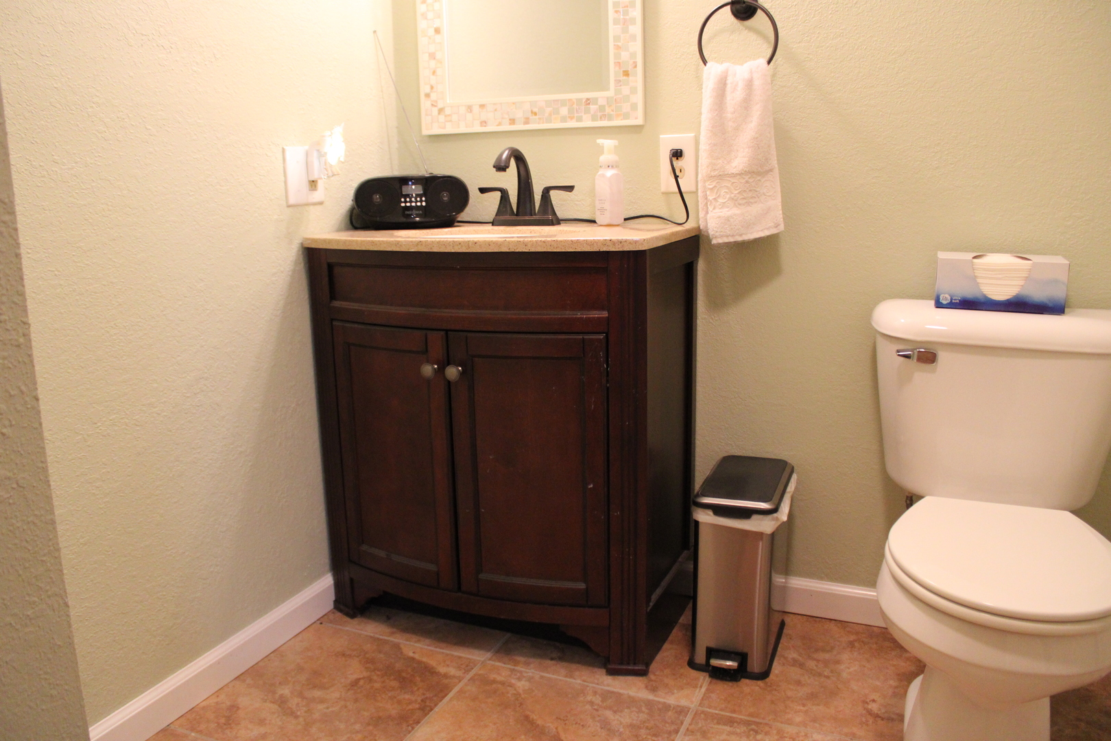 902 Charlotte Drive Normal, IL 61761 - Photo 27 of 35 a bathroom with a toilet a sink and mirror