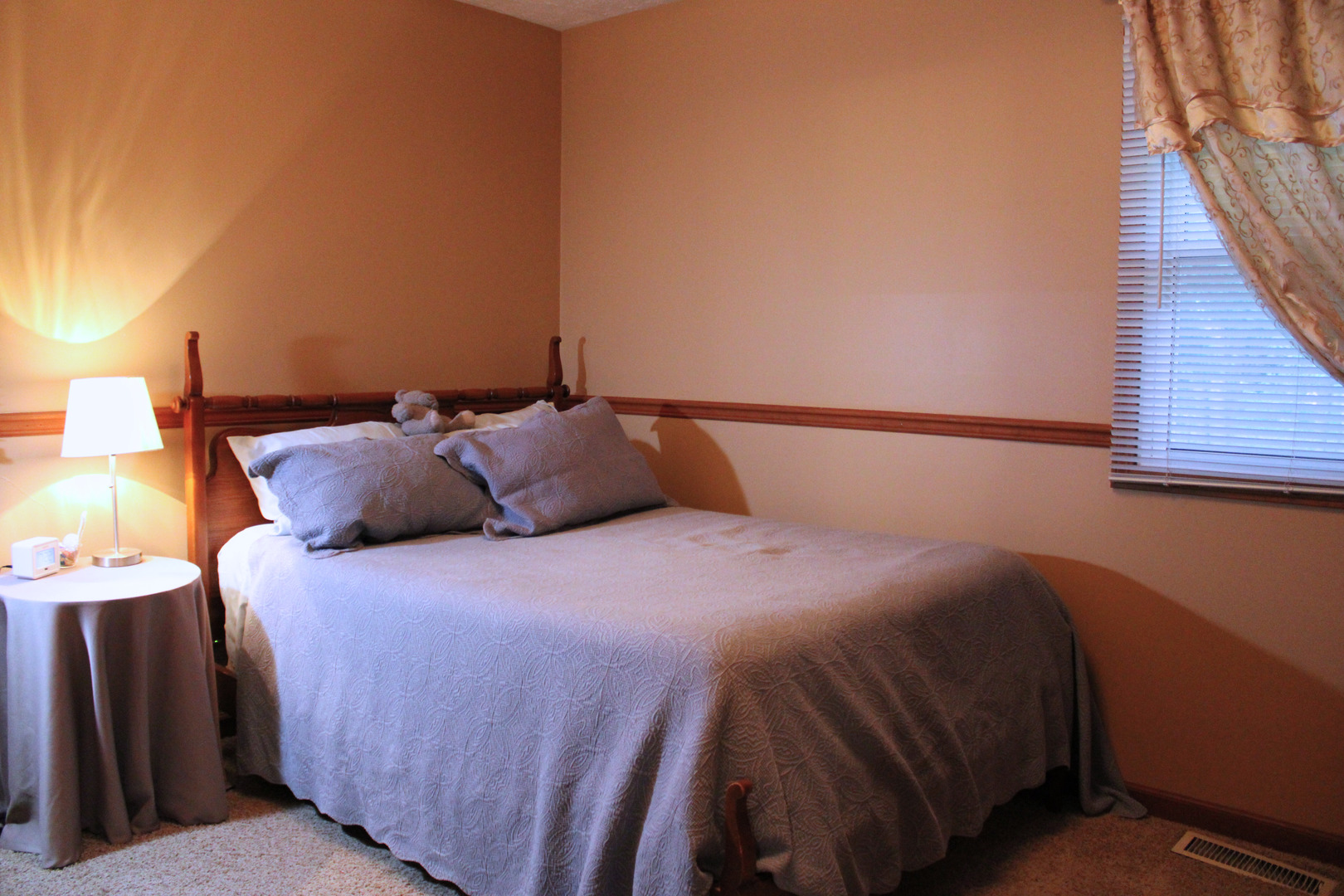 902 Charlotte Drive Normal, IL 61761 - Photo 8 of 35 a bedroom with a bed and wooden floor