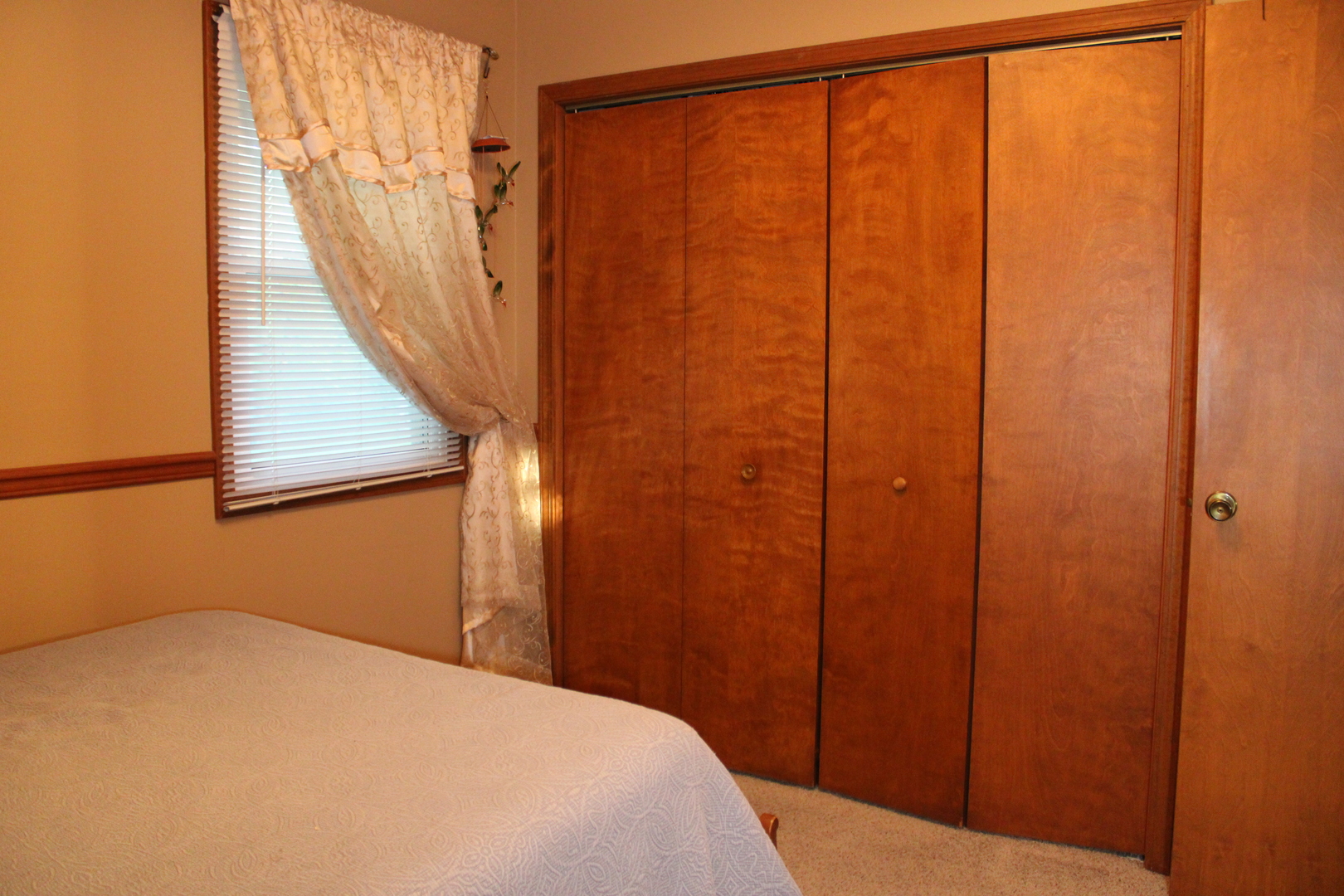 902 Charlotte Drive Normal, IL 61761 - Photo 10 of 35 a bedroom with a bed and a window