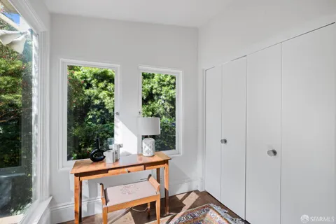 a view of roof with city view