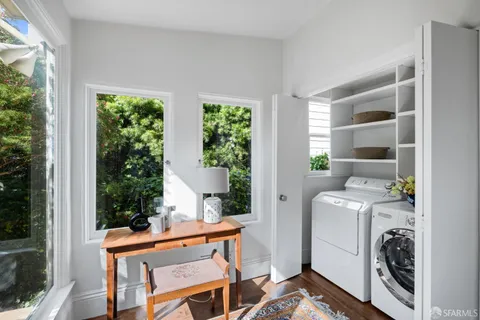 a view of a lake in middle of the forest