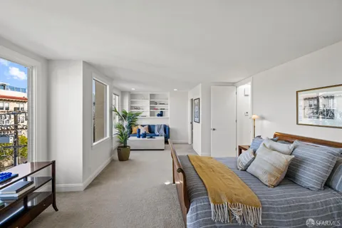 a view of a livingroom with furniture and a couch