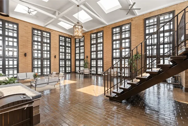 a very nice looking living room with furniture and a flat screen tv