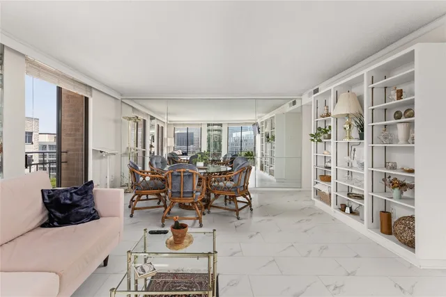 a view of a livingroom with furniture and window