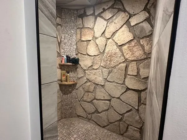 a bathroom with a toilet and a sink