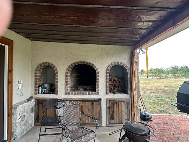 a bathroom with a toilet a sink and a mirror