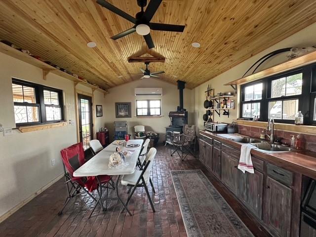 1815 Ranch To Market Road 2597 Sonora, TX 76950 - Photo 20 of 32 a view of a dining room with furniture window and wooden floor
