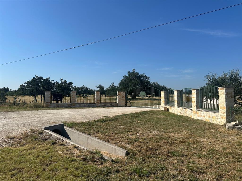1815 Ranch To Market Road 2597 Sonora, TX 76950 - Photo 2 of 32 a view of a house with a yard