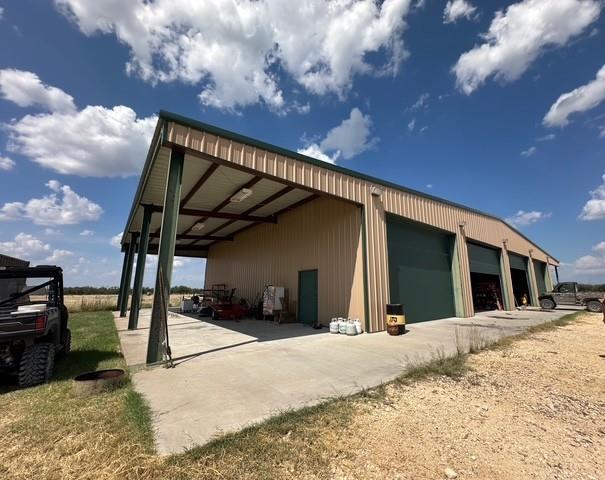1815 Ranch To Market Road 2597 Sonora, TX 76950 - Photo 24 of 32 a view of a house with a patio