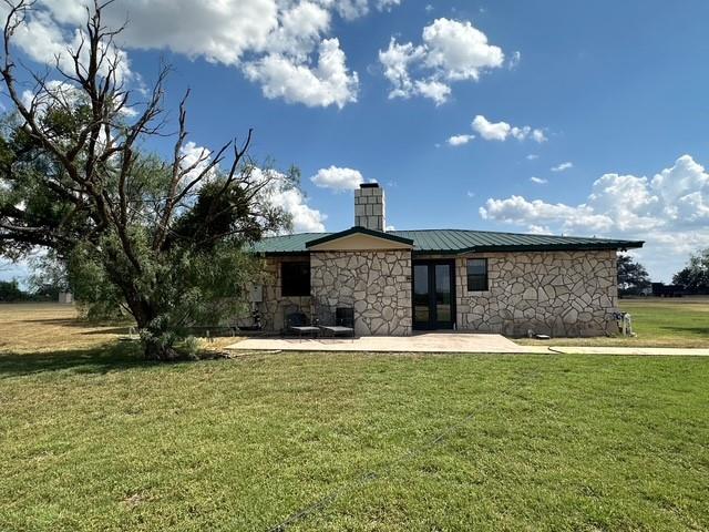 1815 Ranch To Market Road 2597 Sonora, TX 76950 - Photo 3 of 32 a view of a house with a yard
