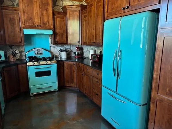 a bedroom with a bed and a mirror