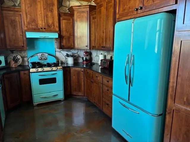 a bedroom with a bed and a mirror