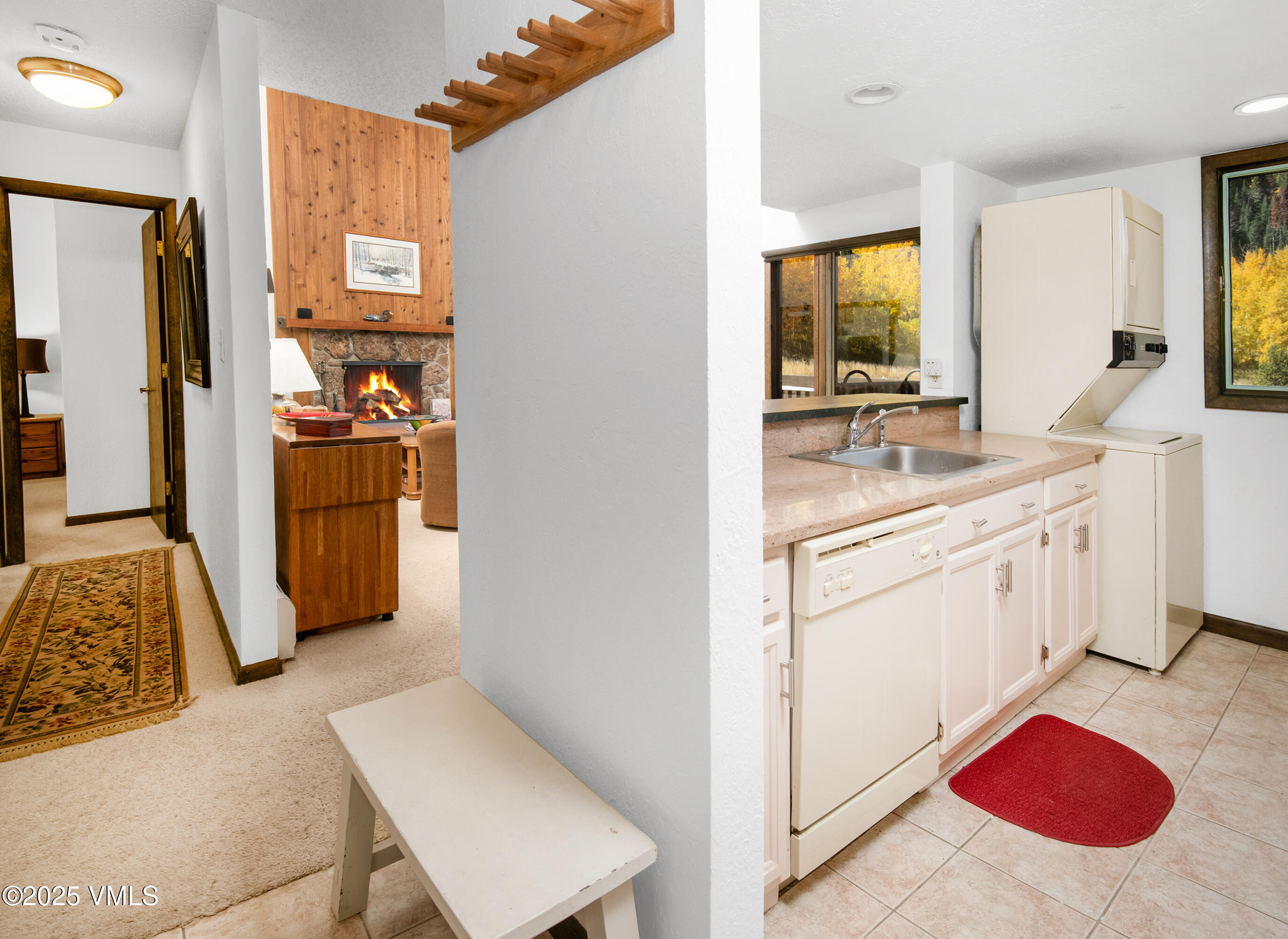 4516 Meadow Drive, Unit 807 Vail, CO 81657 - Photo 11 of 35 a kitchen with a sink cabinets and appliances