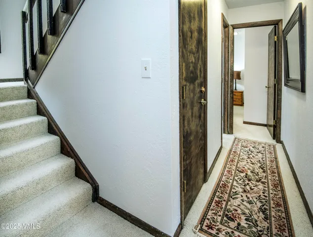 a bed room with a bed and a night stand