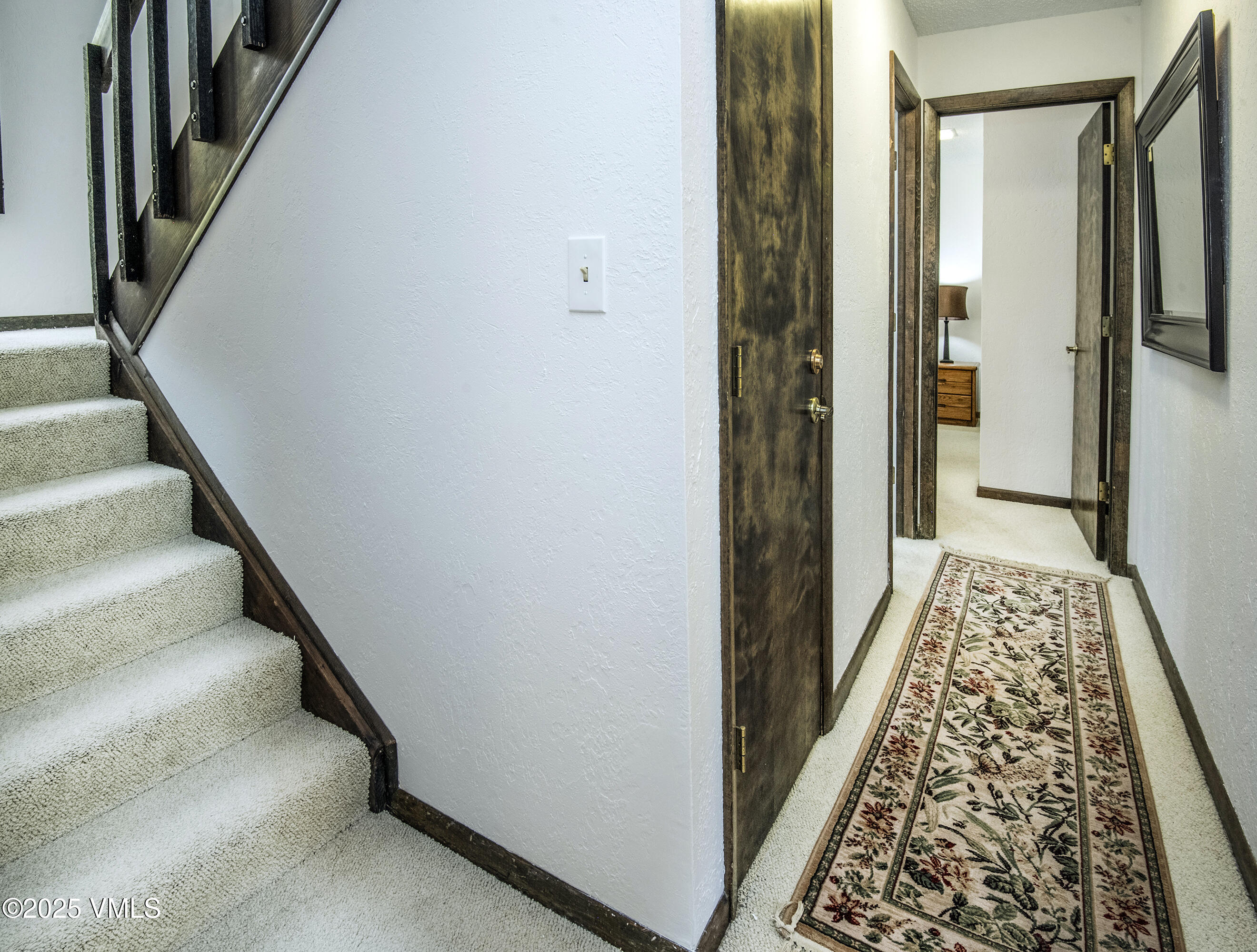 4516 Meadow Drive, Unit 807 Vail, CO 81657 - Photo 15 of 35 a view of hallway with stairs
