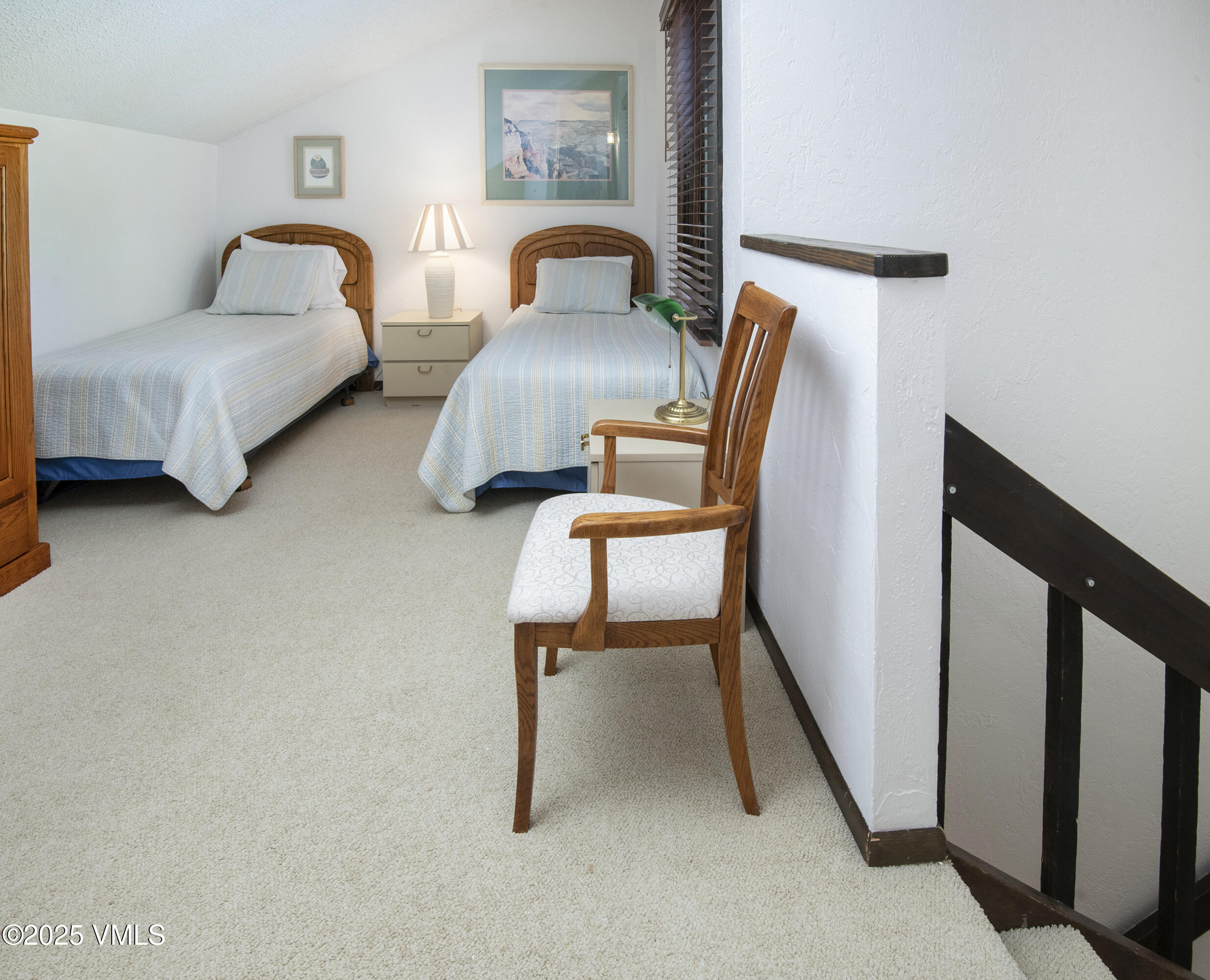 4516 Meadow Drive, Unit 807 Vail, CO 81657 - Photo 18 of 35 a bedroom with furniture and a window