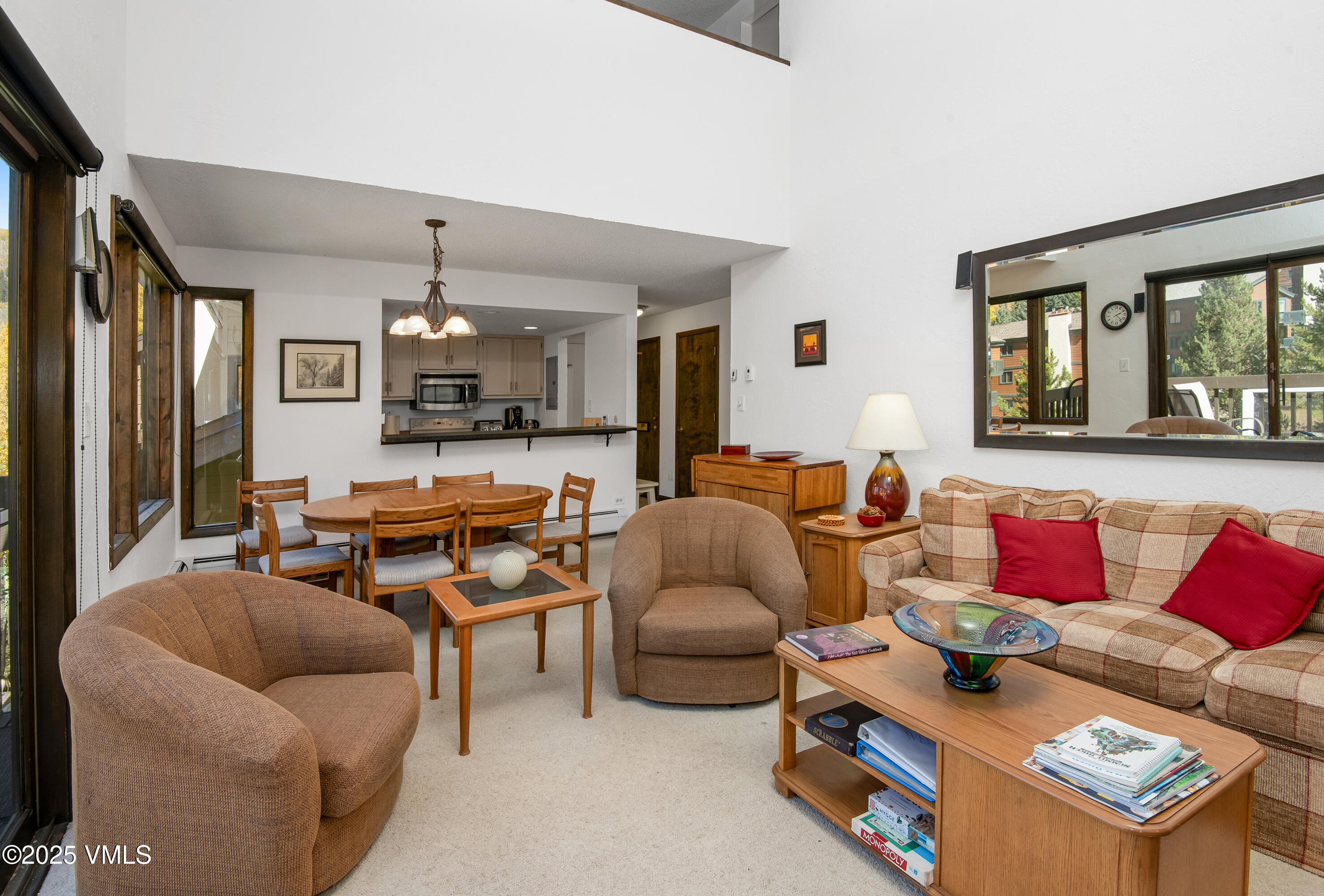 4516 Meadow Drive, Unit 807 Vail, CO 81657 - Photo 9 of 35 a living room with furniture and a flat screen tv