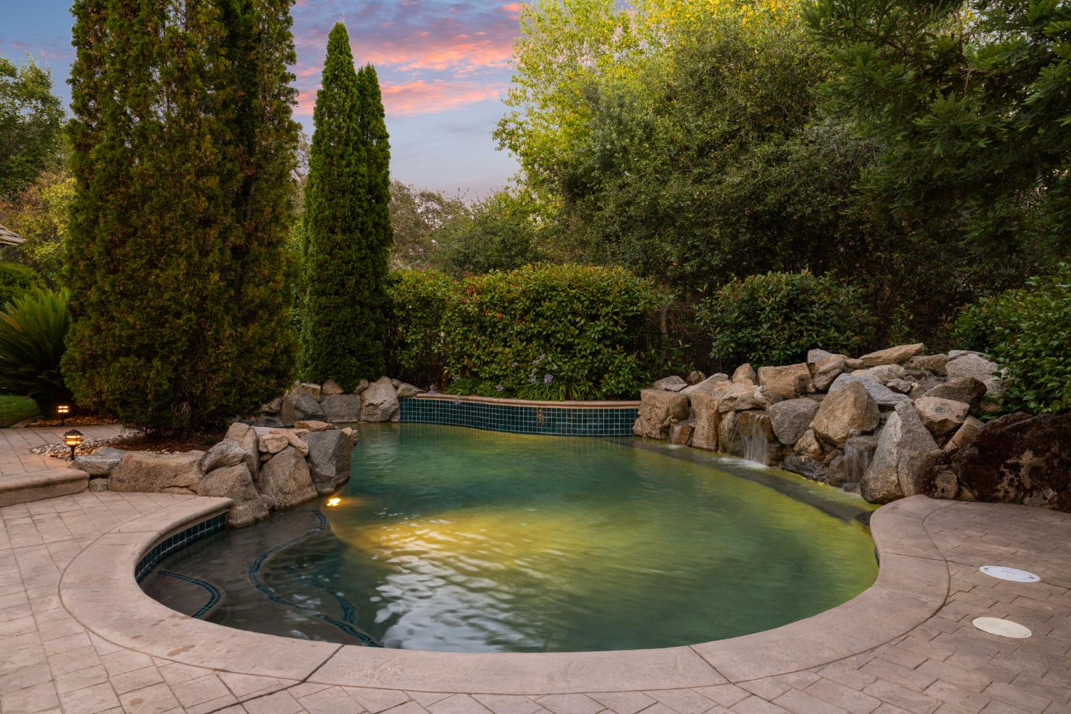 5869 Granite Hills Drive South Granite Bay, CA 95746 - Photo 53 of 66 a view of a swimming pool with a yard