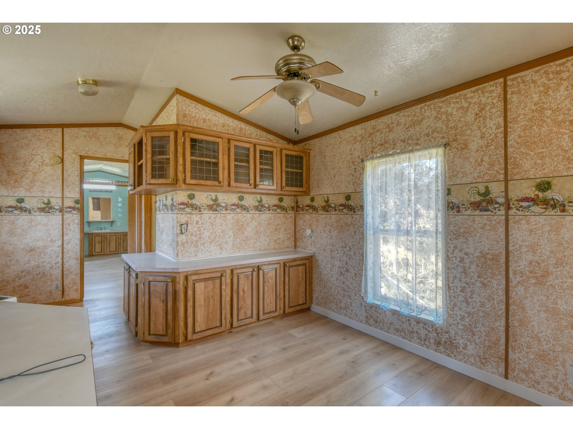 808 Southeast 10th Street Pendleton, OR 97801 - Photo 13 of 18 a view of a house with wooden floor and a glass door
