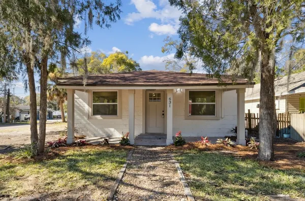 a front view of house with yard