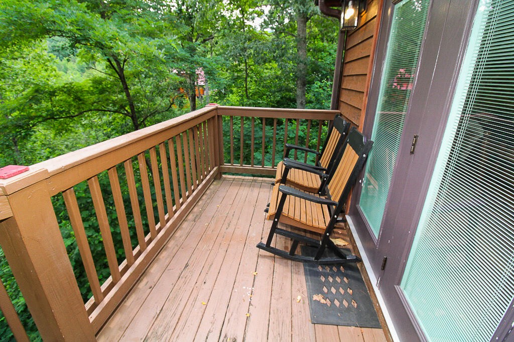 443 Loop Road Gatlinburg, TN 37738 - Photo 19 of 40 a view of balcony with wooden floor