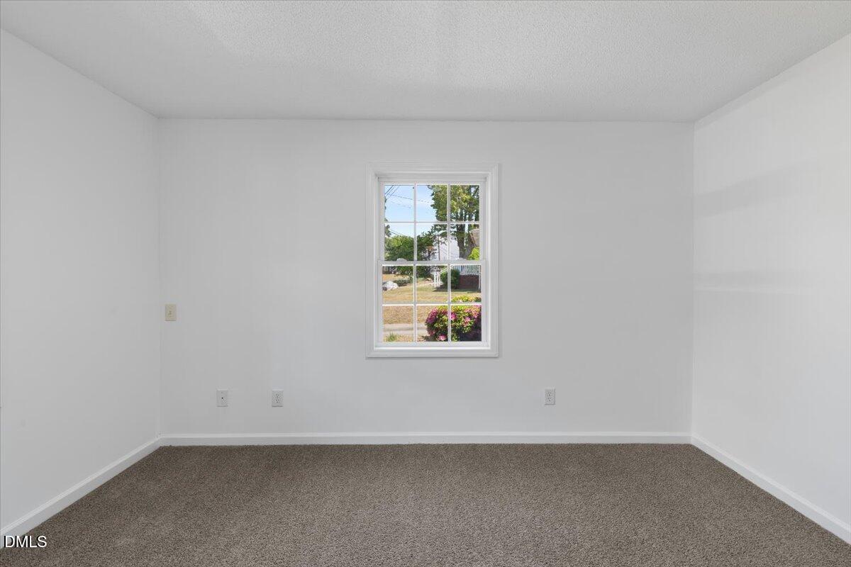 836 South Main Street Roxboro, NC 27573 - Photo 11 of 55 an empty room with a window