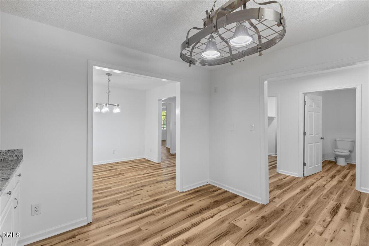 836 South Main Street Roxboro, NC 27573 - Photo 19 of 55 a view of a livingroom with wooden floor
