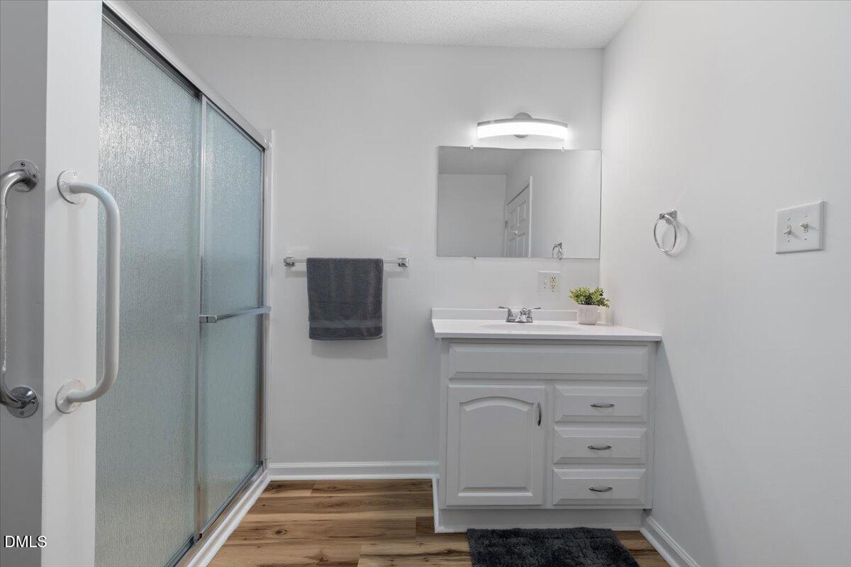 836 South Main Street Roxboro, NC 27573 - Photo 21 of 55 a bathroom with a sink and a mirror