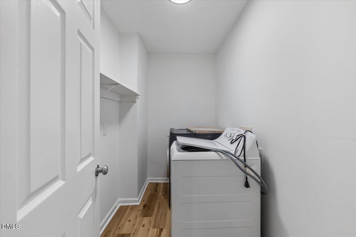 836 South Main Street Roxboro, NC 27573 - Photo 22 of 55 a view of walk in closet with clothes and shoes