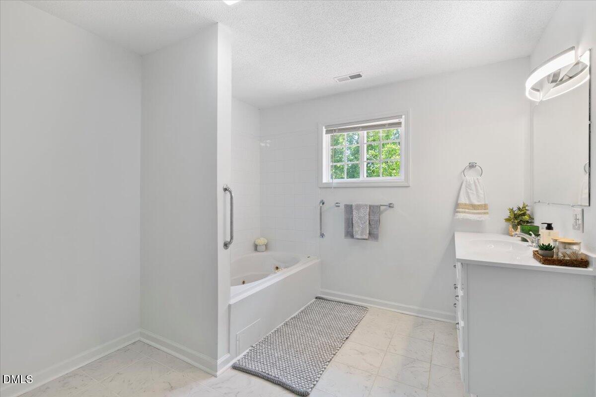 836 South Main Street Roxboro, NC 27573 - Photo 32 of 55 a view of bathroom with bathtub and shower
