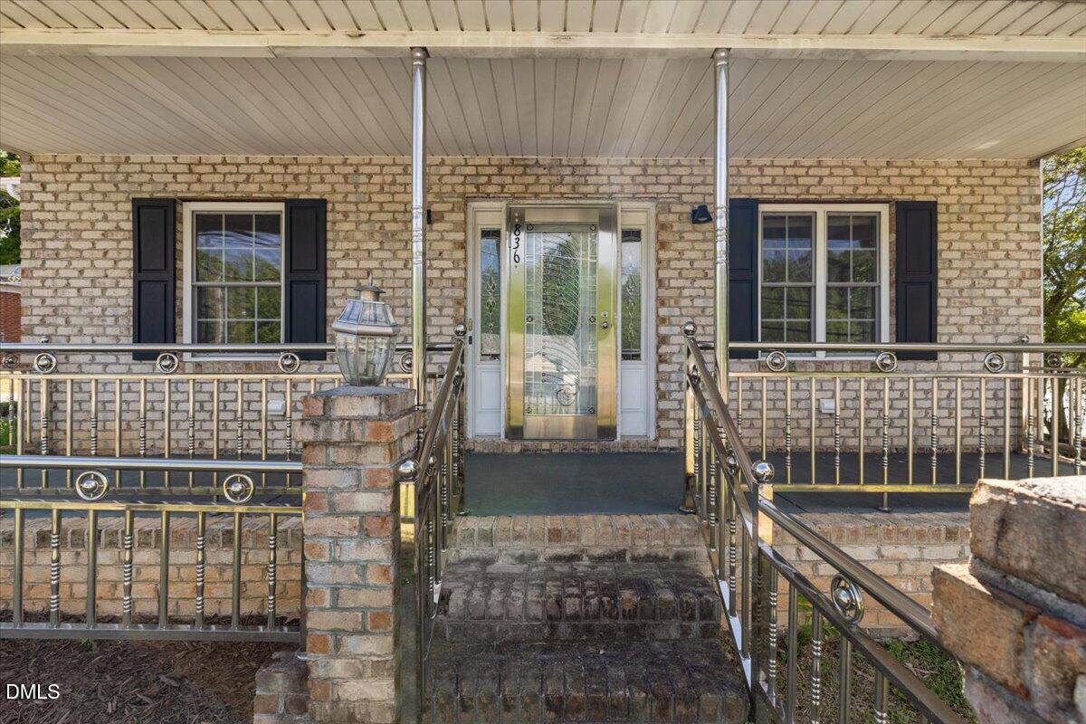 836 South Main Street Roxboro, NC 27573 - Photo 4 of 55 a front view of a house with a large window