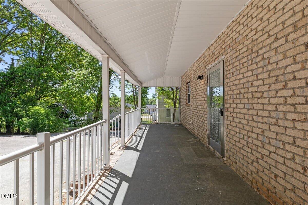 836 South Main Street Roxboro, NC 27573 - Photo 50 of 55 a view of a balcony with wooden floor