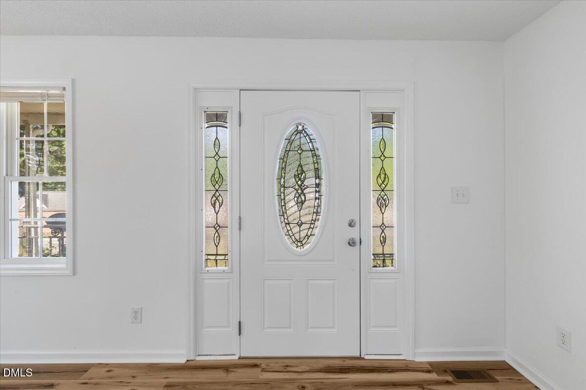 836 South Main Street Roxboro, NC 27573 - Photo 7 of 55 a view of door with wooden door