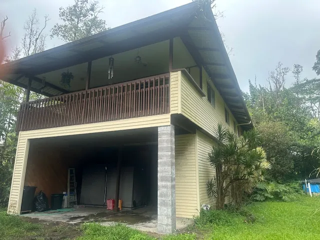 a view of a small yard front of house