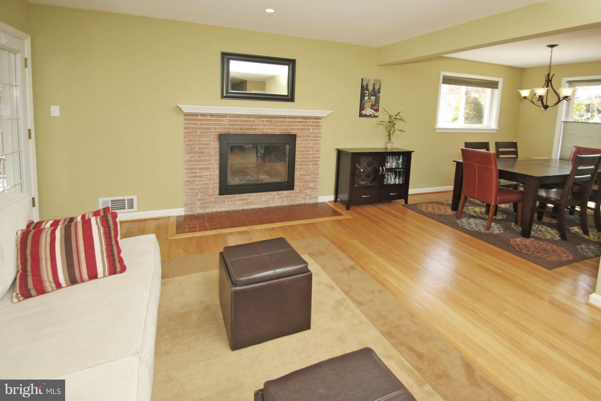 10711 Lombardy Road Silver Spring, MD 20901 - Photo 3 of 24 A fireplace adds a cozy touch