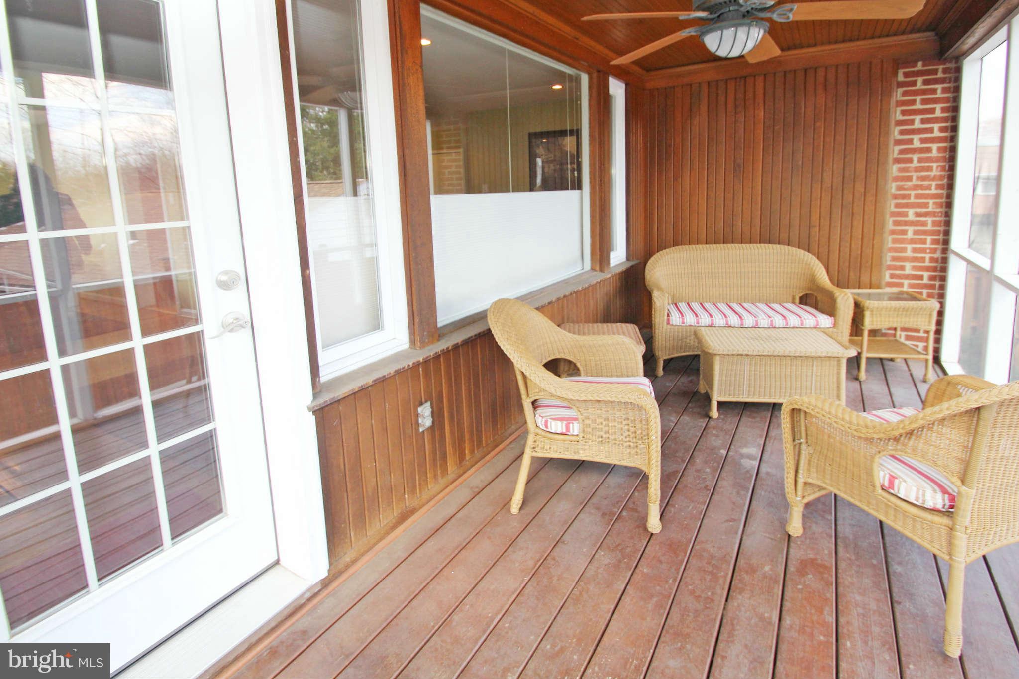 10711 Lombardy Road Silver Spring, MD 20901 - Photo 5 of 24 Screened porch is just off the living room.