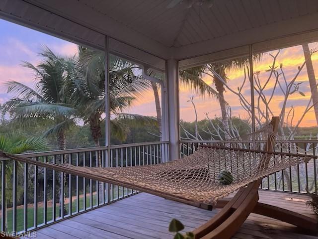 18481 Pioneer Road Fort Myers, FL 33908 - Photo 43 of 44 View of deck at dusk