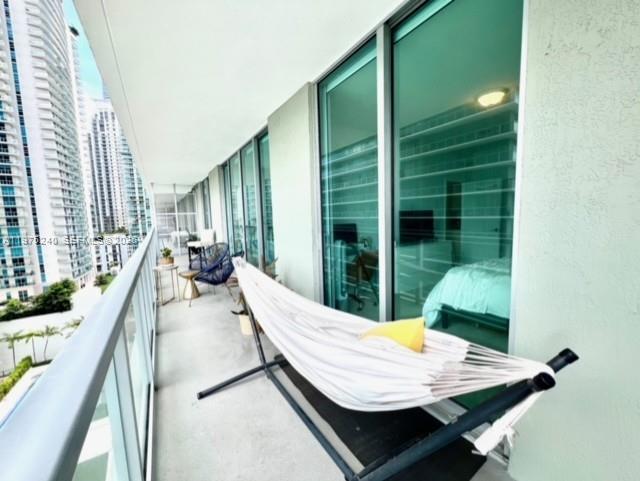 79 Southwest 12th Street, Unit 2010 Miami, FL 33130 - Photo 18 of 20 a view of an outdoor sitting area with furniture
