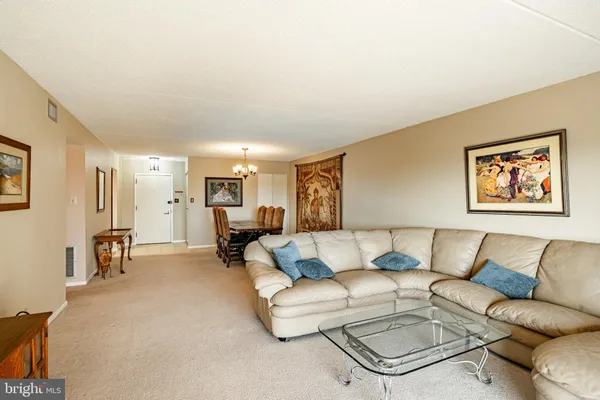 a living room with furniture and a couch