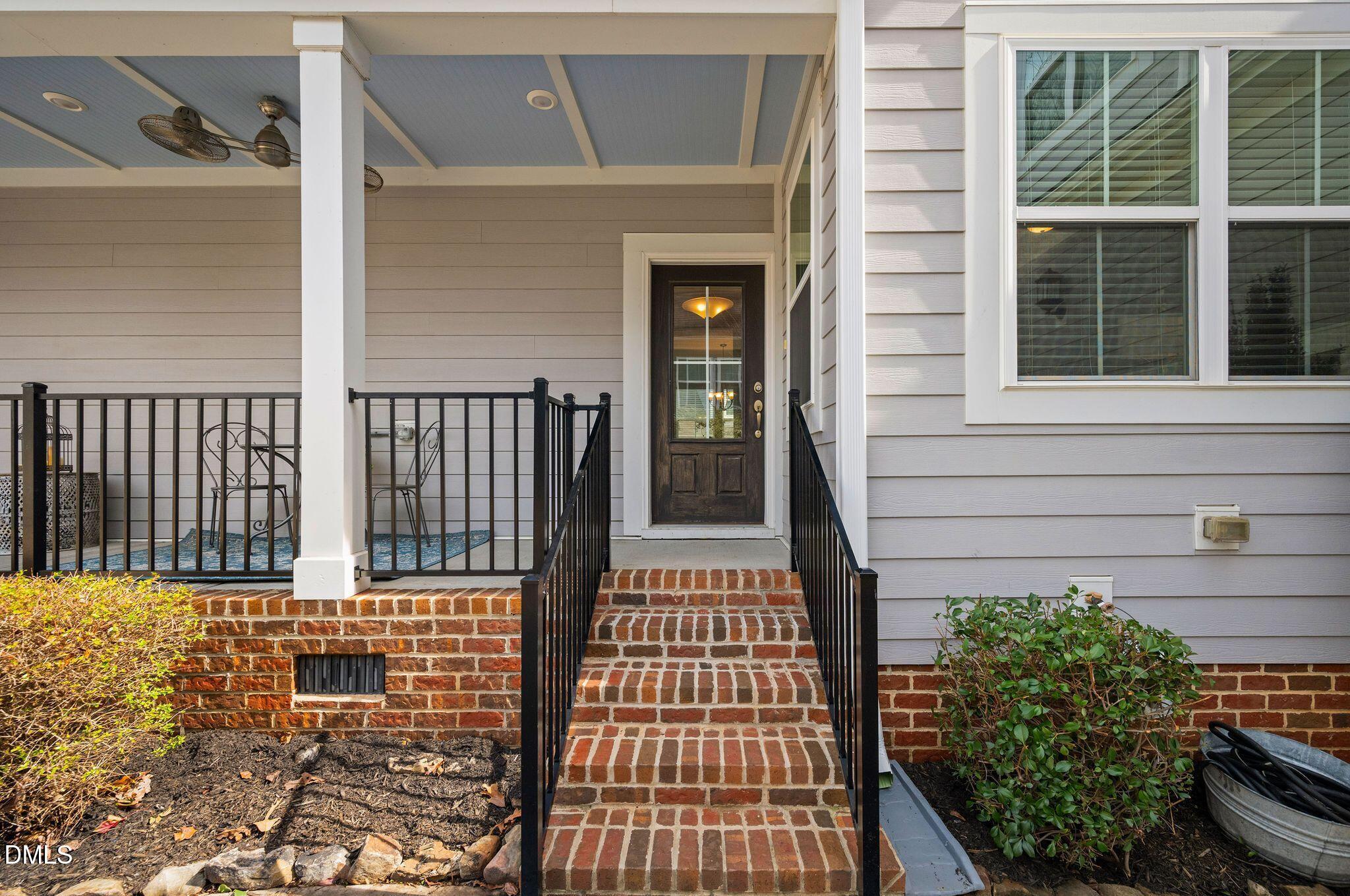 528 Spring Flower Court Cary, NC 27511 - Photo 5 of 51 a view of a balcony with a potted plant