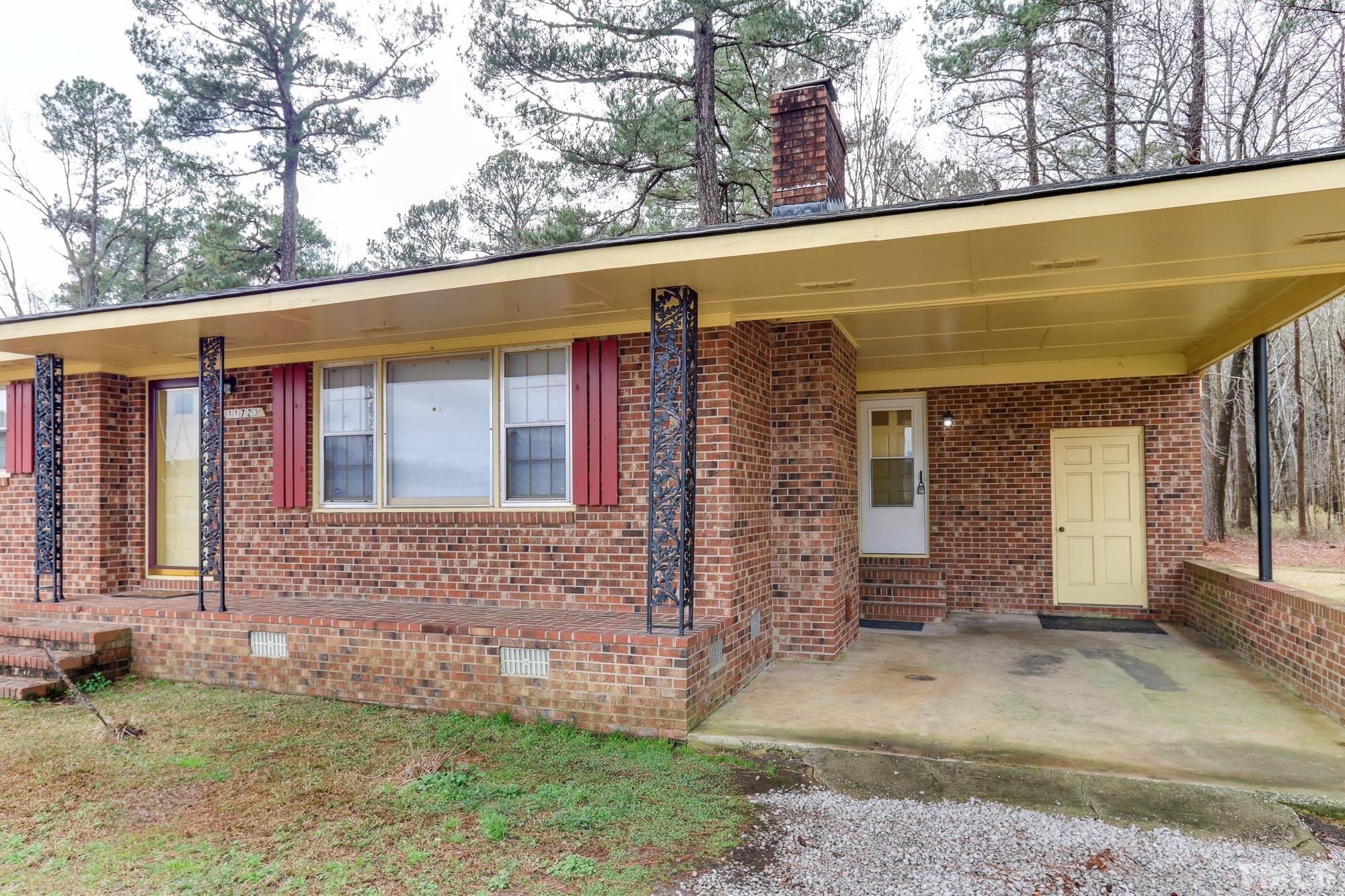 11723 Claude Lewis Road Middlesex, NC 27557 - Photo 2 of 27 front view of a house with a yard
