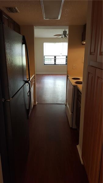 4541 West McNab Road, Unit 26 Pompano Beach, FL 33069 - Photo 7 of 12 a view of empty room with window