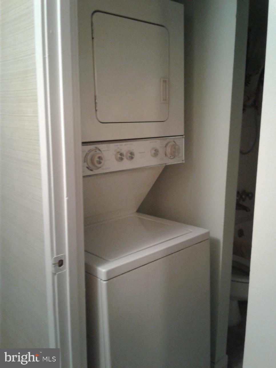 5717 Harpers Farm Road, Unit E Columbia, MD 21044 - Photo 15 of 21 a utility room with dryer and washer