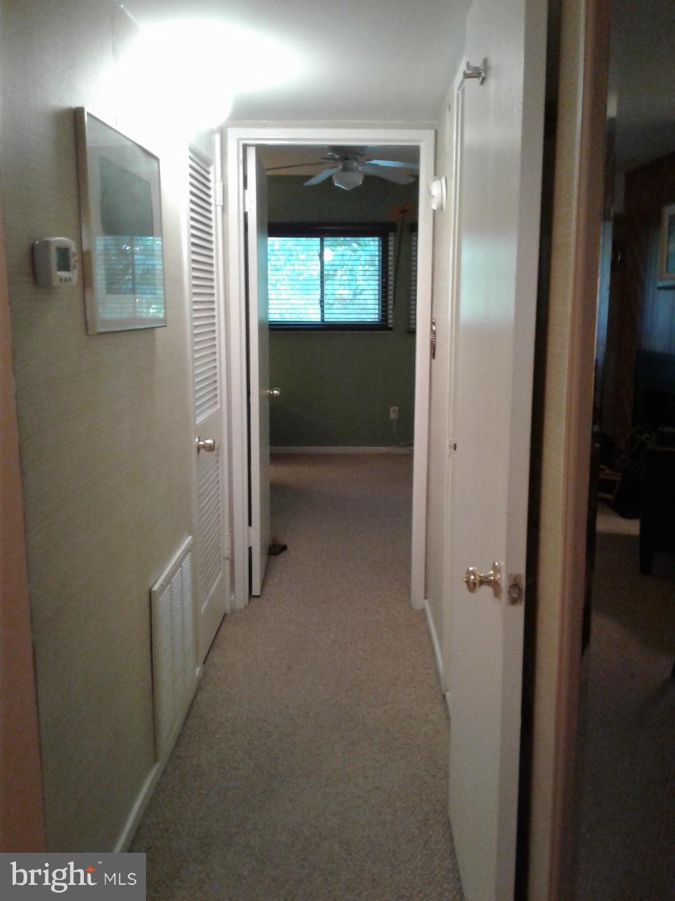 5717 Harpers Farm Road, Unit E Columbia, MD 21044 - Photo 17 of 21 a view of hallway with a hallway and a window
